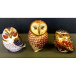 A Royal Crown Derby Paperweight, Tawney Owl, gold stopper; others Barn Owl gold stopper; Little Own,