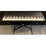 Musical instruments- A Yamaha YPP-50 electric piano with stand.