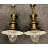 A pair of contemporary Industrial style pendant light fittings, brushed brass finish, white enamel