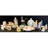 A late 19th century German figure; others; Royal Worcester spill vases; flat back of Dick Turpin;
