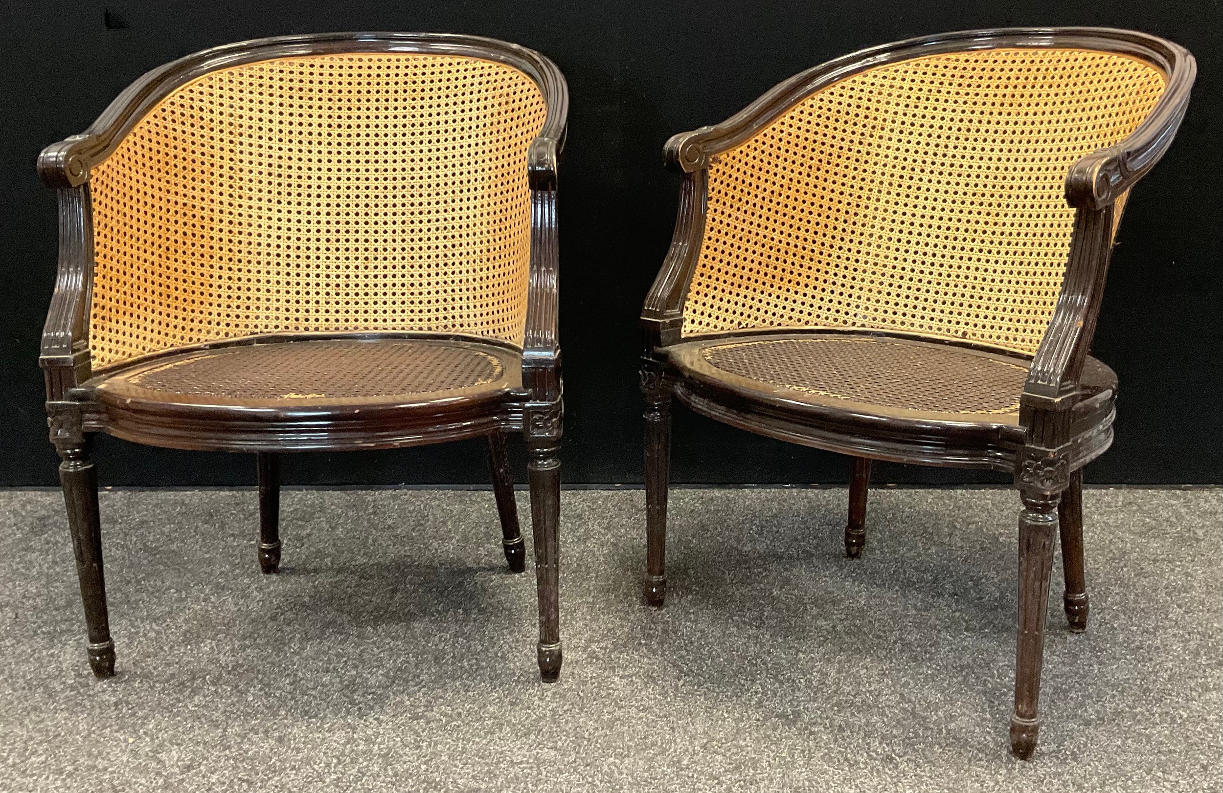 A pair of mid 20th century Bergere weave salon tub chairs, (2).