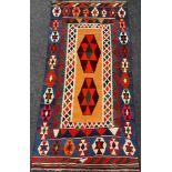 A South-west Persian Qashqai Kilim rug / carpet, knotted in bold colours with pair of Hexagonal form