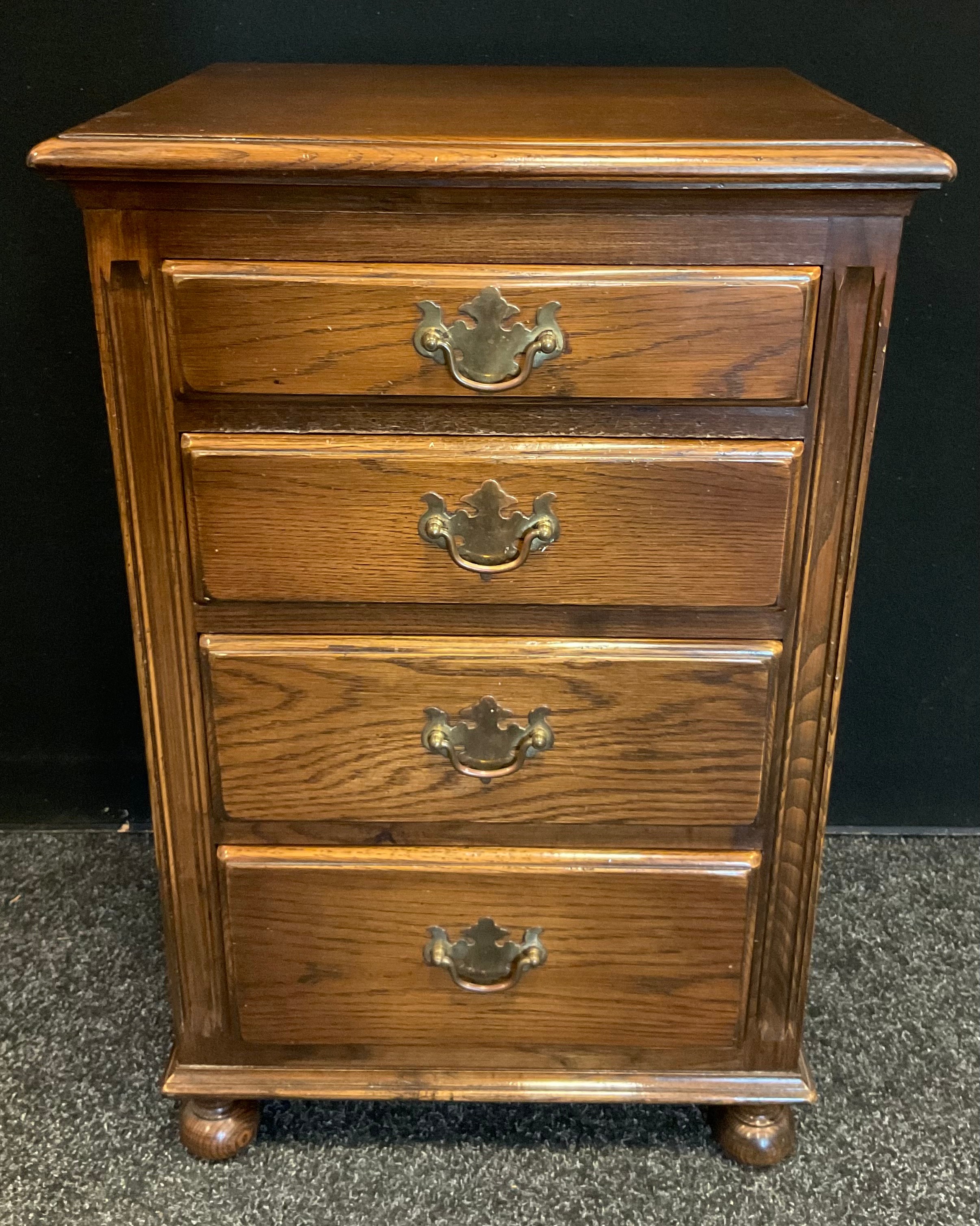 A small Bevan Funnell narrow oak chest, four graduated drawers, bun feet, 70cm tall x 45cm wide x - Image 3 of 3
