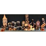 Tribal Art - a blackened terracotta tribal figure, signed Flora; carved busts, wall mask, totem,