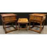 A pair of oak bedside cabinets, each with single drawer to frieze, turned legs, 53cm tall x 41cm x