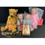 Toys - a mid 20th century gold plush teddy bear, vertical stitched eyes and nose, pointed nose, V
