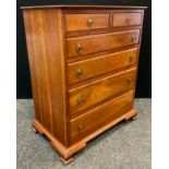 A Stickley brothers cherry wood chest of drawers, two short over four long graduated drawers,