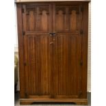 An oak double wardrobe by AY Crown furniture, 182cm tall x 128.5cm wide x 58.5cm deep.