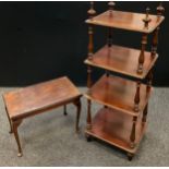 A Victorian mahogany four tier What-not, turned finials and supports, rounded rectangular shelves,