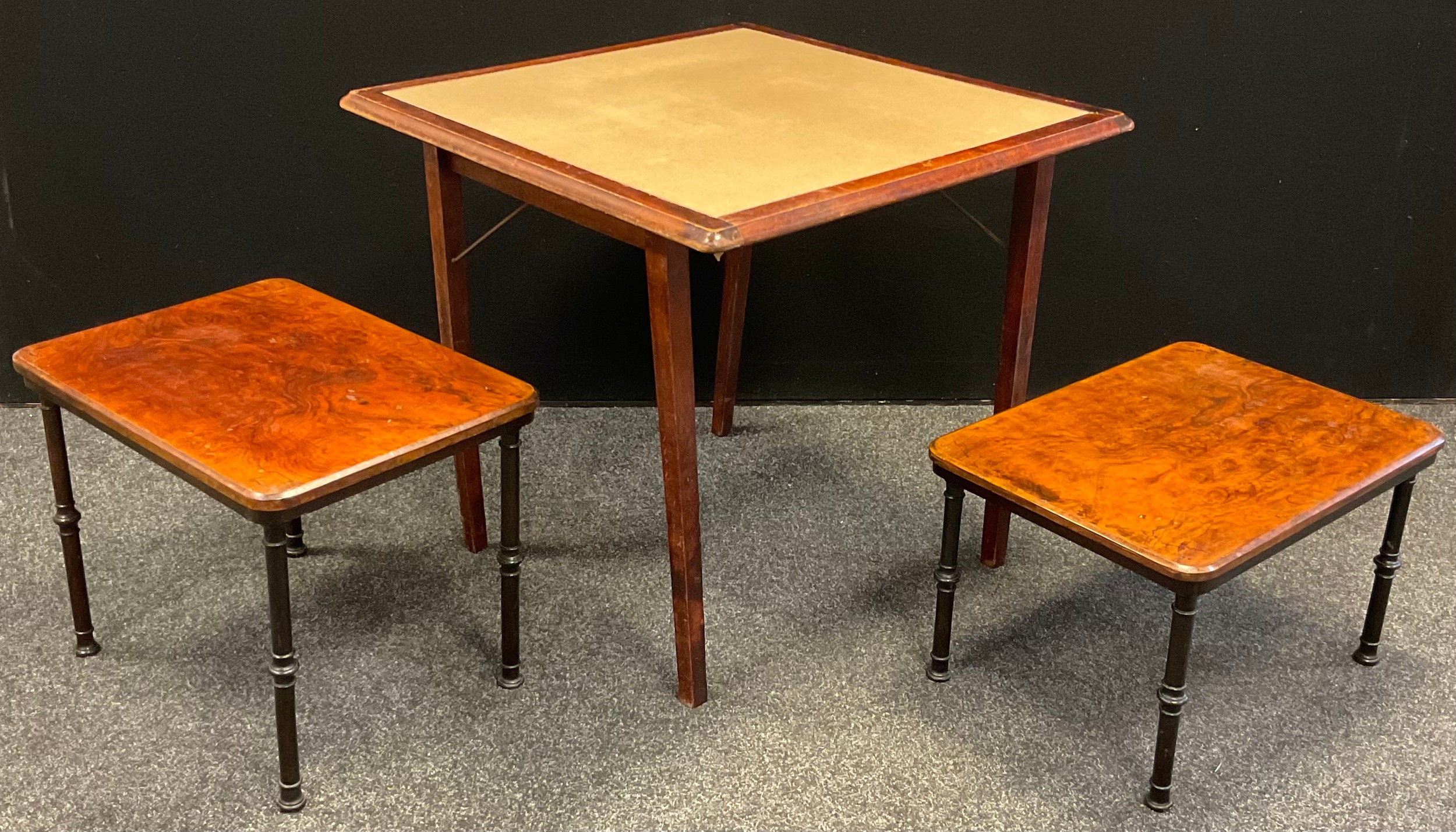 An early 20th century campaign type card / games table; a similar pair of walnut occasional