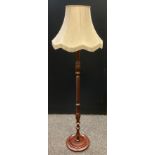 A Victorian style mahogany standard lamp, turned and spirally fluted column, disc base, 178cm tall