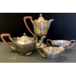 A George V silver matched four piece tea set, coffee pot, milk jug and sugar bowl, Barker Brothers