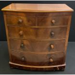 A Victorian mahogany bow-front chest of two short over three long graduated drawers, 115.5cm x 104.