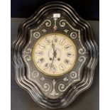 A 19h century French cartouche shaped wall clock, Roman numerals , brass bezel, twin winding