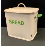 A cream and green enamelled bread bin, 31cm high, 39cm long, 23.5cm deep