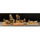 Mining Interest - a brass scale model of a miner at the coal face; others cart and horses, winch