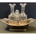 An early 20th century Christoffel silver plated oval oil and vinegar bottle stand, boat shaped base,