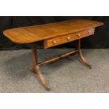 A late 19th century regency style mahogany sofa table, rectangular top, with D-shaped drop ends,