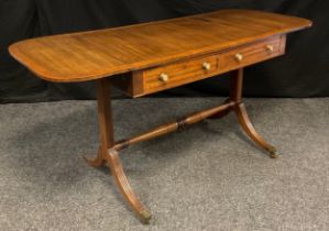 A late 19th century regency style mahogany sofa table, rectangular top, with D-shaped drop ends,