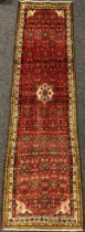 A North-west Persian Hamadan rug / runner carpet, 266cm x 73cm.