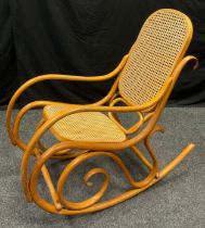 A Thonet style bentwood rocking chair, mid 20th century.