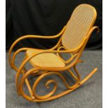 A Thonet style bentwood rocking chair, mid 20th century.