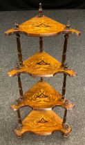 A Victorian inlaid walnut whatnot, shaped front, four graduated tiers, turned supports, 115cm
