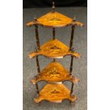 A Victorian inlaid walnut whatnot, shaped front, four graduated tiers, turned supports, 115cm