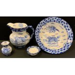 A Masons ironstone blue and white wash set, transfer printed with a dragon and phoenix in the