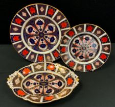 A Royal Crown Derby oval 1128 Imari boat dish, acorn handles, 29cm long; conforming dinner plate,
