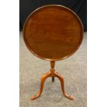 A 19th century mahogany wine table, circular tilt top, 49.5cm diameter, turned column, tripod