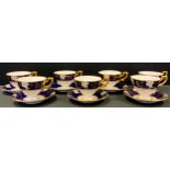 Royal Crown Derby - six Cobalt Vine pattern tea cups and saucers, another cup