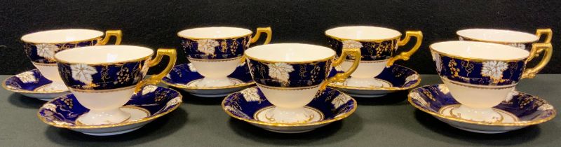 Royal Crown Derby - six Cobalt Vine pattern tea cups and saucers, another cup
