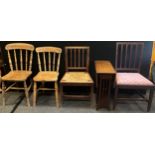 A pair of pine kitchen chairs; 19th century oak dining chair, rush seat; another, drop in seat; a