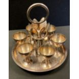 A late 19th century Hukin & Heath silverplated egg cruet, six egg cups and spoons, H & H marks, No