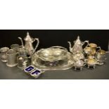 A Viners Sheffield silver plated four piece tea set; tray; table salts; helmet sugar bowl; pewter