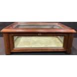 A 19th century mahogany rectangular table top bijouterie, hinged cover with inlaid border, 51cm