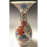 A Chinese vase, with flared neck, decorated with official and attendants, in the Imari palette, 37.