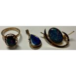 A 9ct gold Australian opal ring, size N/O, marked 375, 2.7g; an Australian opal pear shaped pendant,