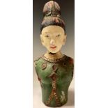 A painted carved wooden bust of an Asian lady, 42cm high