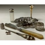A Victorian silver and mother of pearl butter knife, Birmingham 1848; a silver sweetmeat dish;