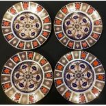 A set of four Royal Crown Derby 1128 pattern dinner plates, second quality