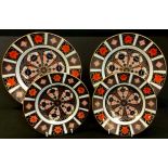 A pair of Royal Crown Derby 1128 patter dessert plates, second quality; another pair of side