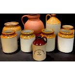 A collection of Victorian and later stoneware preserve jars, flagons, etc (9)