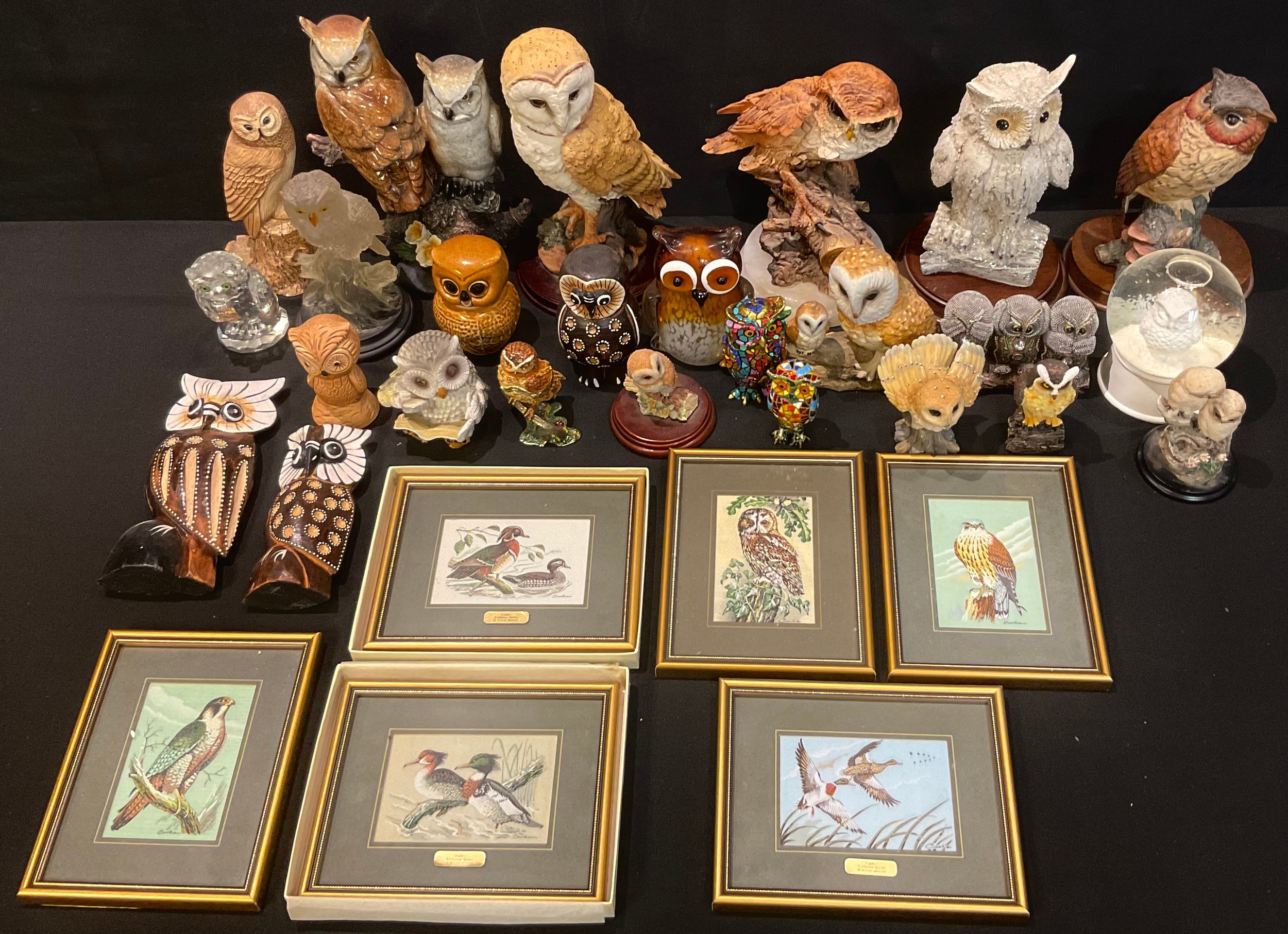 A Leonardo ceramic model, Tawny Owl, 18cm, circular wooden base; others, Barn Owls; a Regency Fine