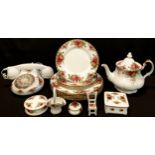 A Royal Albert Old Country Roses pattern teapot, telephone, six dinner plates, four dessert