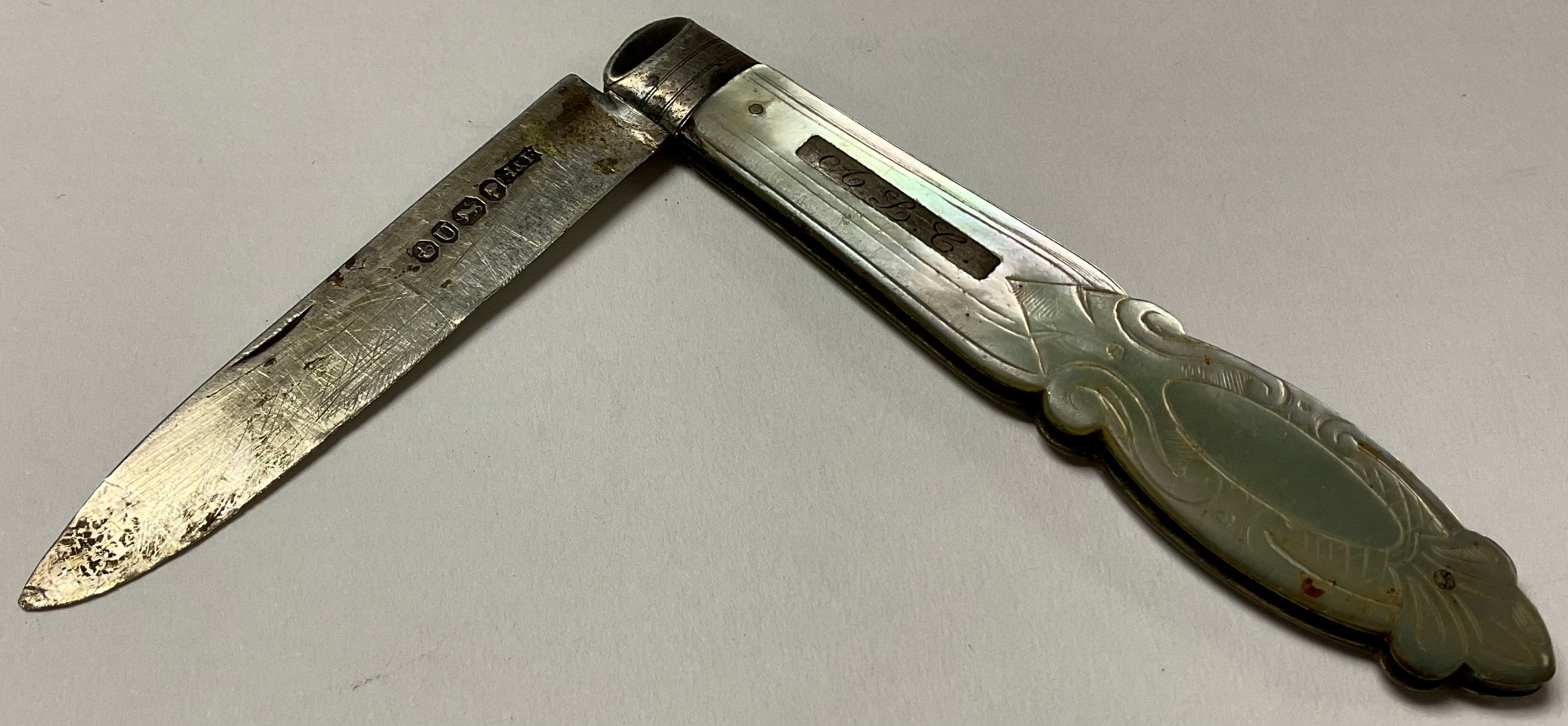 A Victorian silver and mother of pearl folding pocket fruit knife, Sheffield 1862