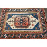 A Turkish wool rug or carpet, 334cm x 239cm