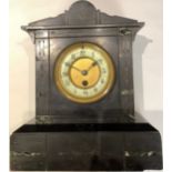 A 19th century belge noir mantel clock, 33cm high