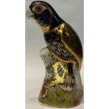 A Royal Crown Derby paperweight, Bronze Winged Parrot, gold stopper, printed mark